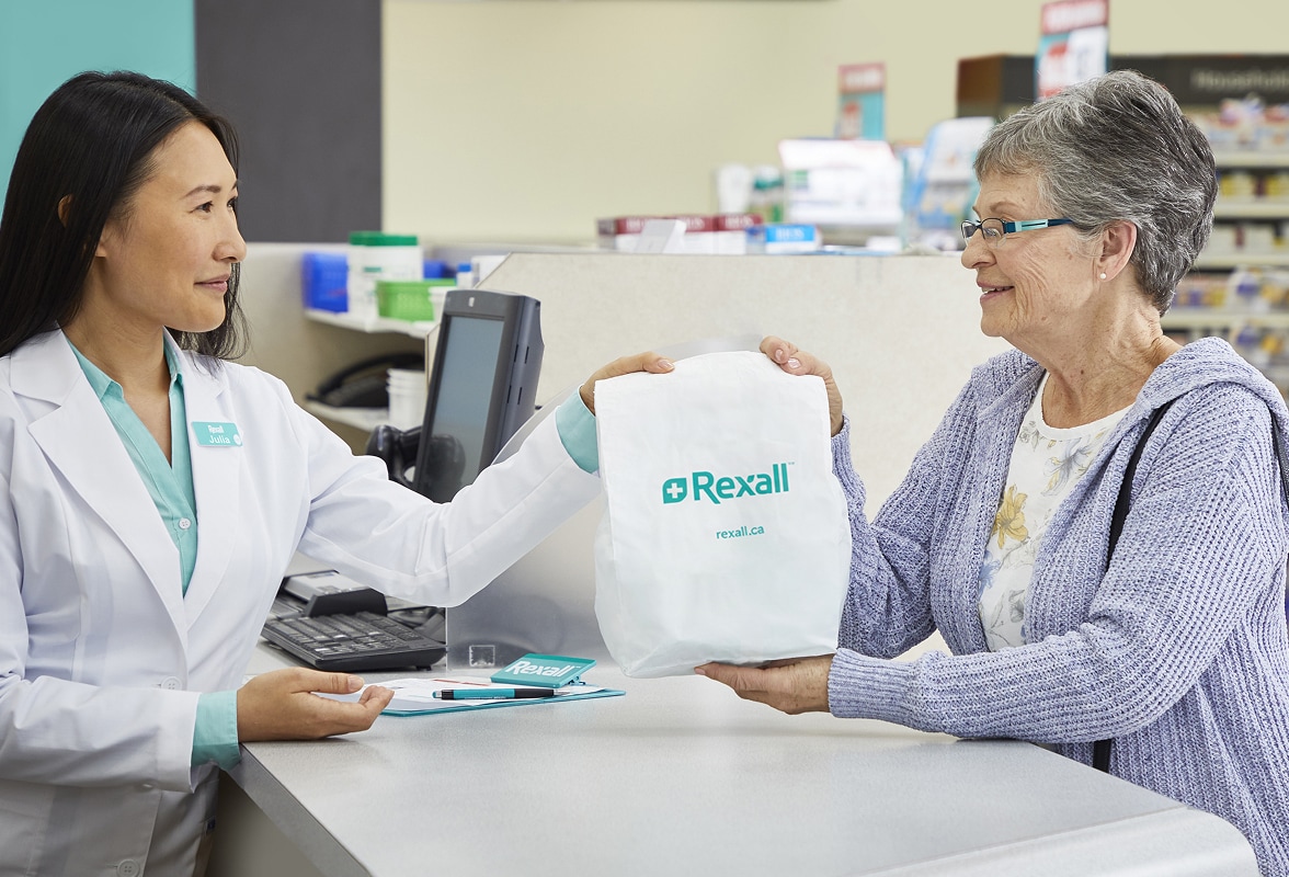 Rexall Pharmacist providing professional healthcare services