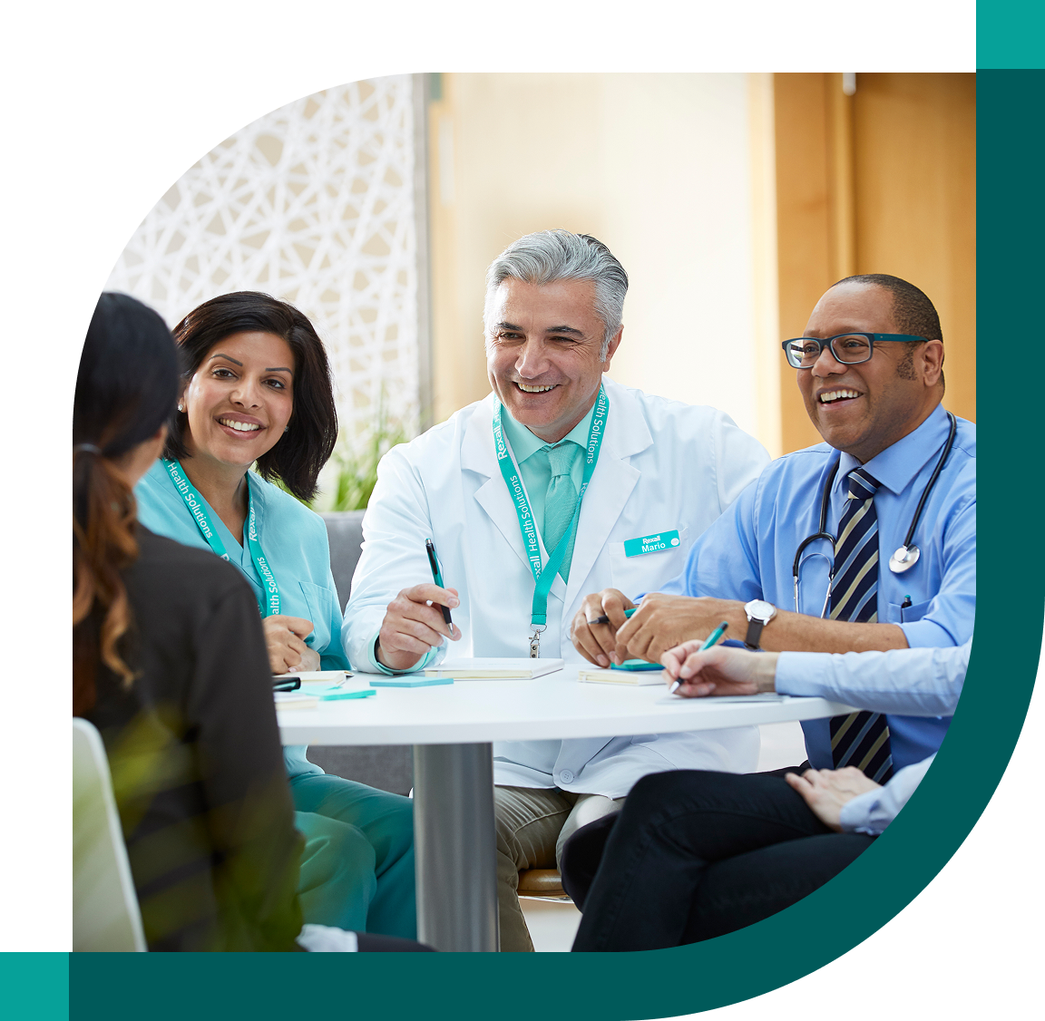 Physicians working with patients on treatment plans